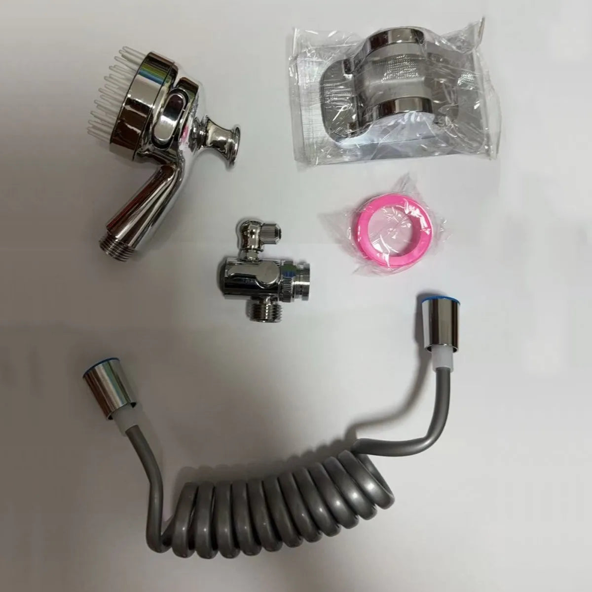 Washbasin hand shower set, with external hand shower head and hose, suitable for shampooing, pet showering, and bathroom use.